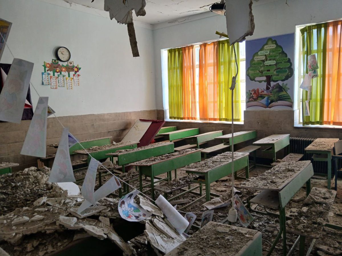 A damaged classroom after an airstrike hit a school in Iran.