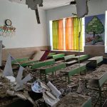 A damaged classroom after an airstrike hit a school in Iran.