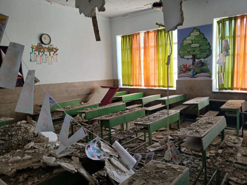A damaged classroom after an airstrike hit a school in Iran.